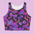 Honey Dazed Brand body-hugging racerback crop top featuring Y2K-inspired print with purple gradient cherries, holographic bows, and swirling patterns in pink, purple, and blue on black background in performance knit fabric